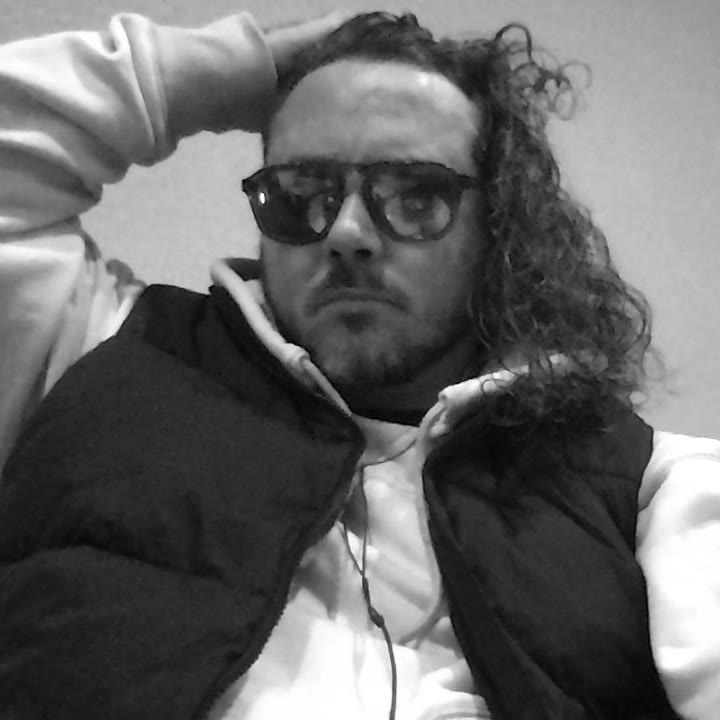 Sean Patrick Barrett, sunglasses, white hoodie and black vest, September 27, 2026 (2 of 9)