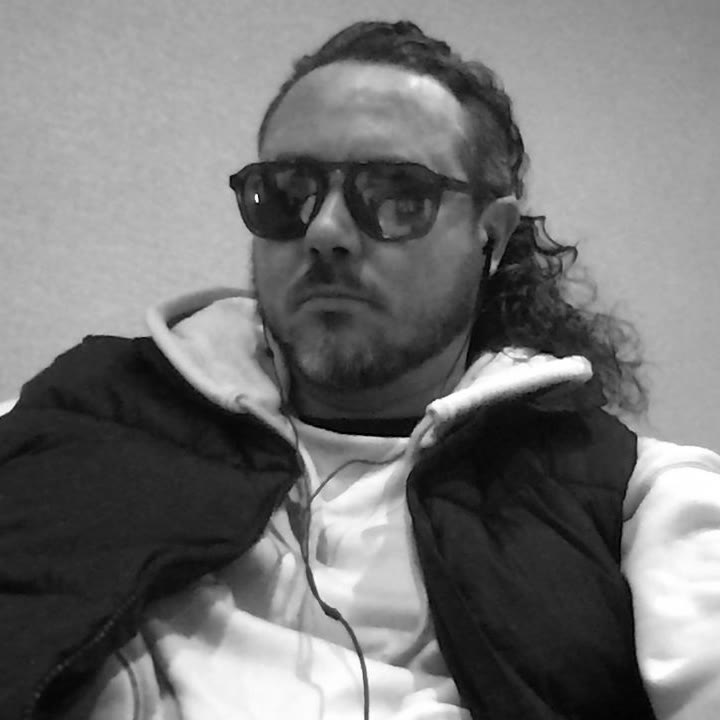 Sean Patrick Barrett, sunglasses, white hoodie and black vest, September 27, 2026 (3 of 9)