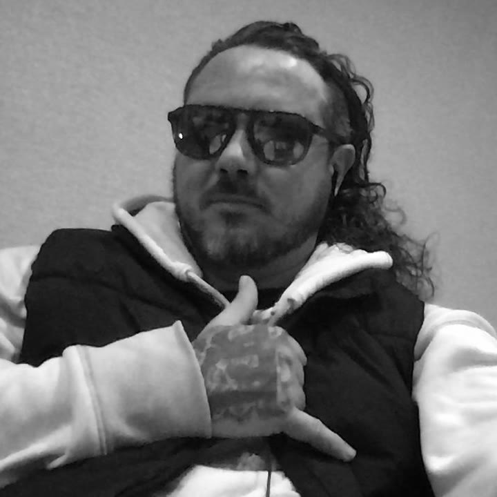 Sean Patrick Barrett, sunglasses, white hoodie and black vest, September 27, 2026 (5 of 9)