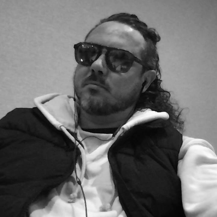 Sean Patrick Barrett, sunglasses, white hoodie and black vest, September 27, 2026 (6 of 9)