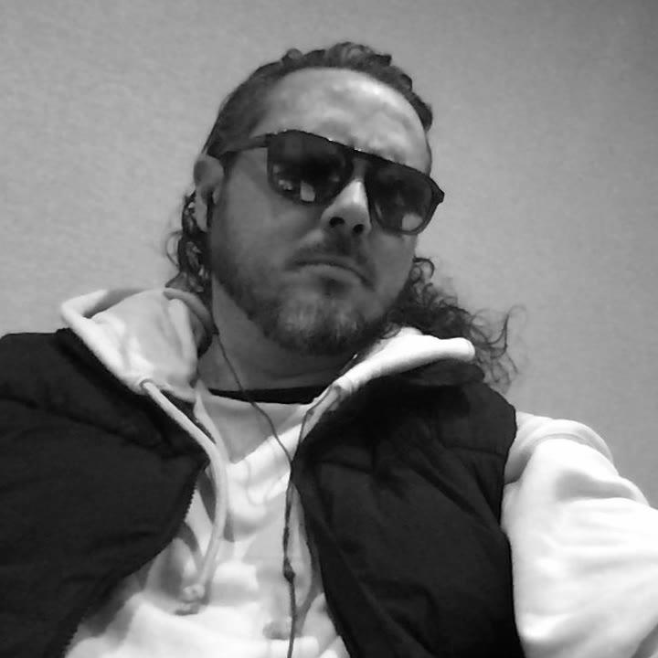 Sean Patrick Barrett, sunglasses, white hoodie and black vest, September 27, 2026 (9 of 9)